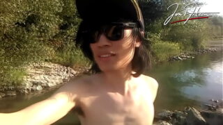 Jon Arteen is this slim Asian twink boy dancing a musical strip-tease on the river smiling showing his full pubes doing outdoor gay porn with a sneaker and underwear fetish